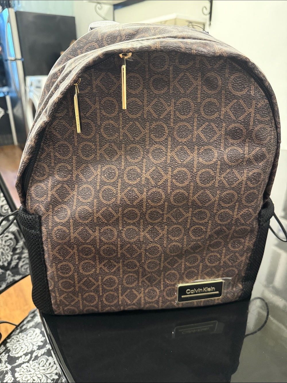 Calvin Klein Monogram Mini Backpack in Brown with Gold Hardware